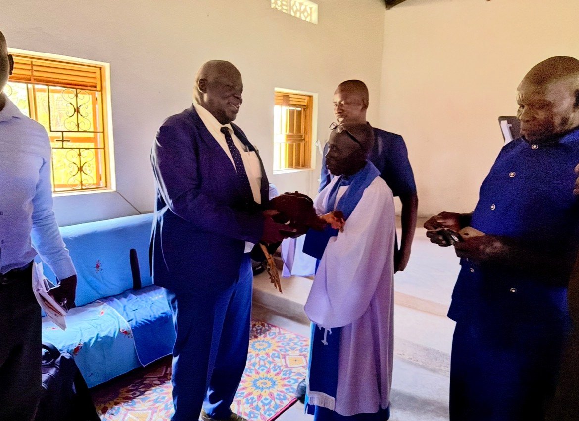 Church Leaders at Awebada COU Gift Hon. Sam Engola a Chicken, Minister Pledges Car and Motorbike in Return
